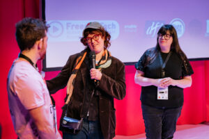 Sophie Motley, Artistic Director of Project Arts Centre speaks on the stage alongside Disrupt Director AlanJames Burns and FreedomTech's Sarah Boland. This was part of the industry event on The Role of Assistive Technology in Art.